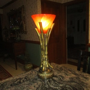 tall bamboo torch /up light with burnt orange shade