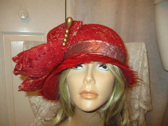 Mr. John Moderne wool flet cloche with lace bow and feather detail
