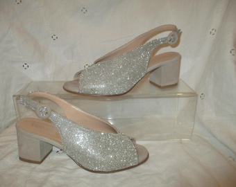 Vernissage silver metallic open toe sling back pumps