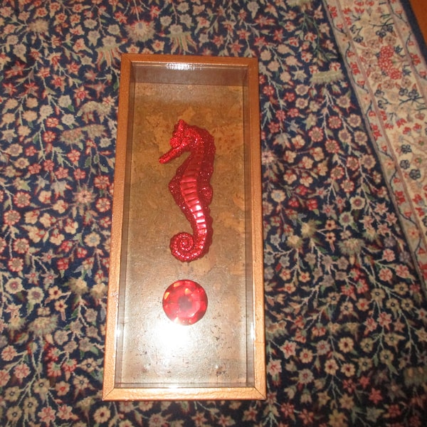 large red seahorse shadow box with huge faux ruby