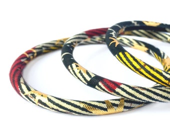 African wax bracelet, chic bohemian bangles in Ankara print with touches of gold, these bracelets come in 2 sizes