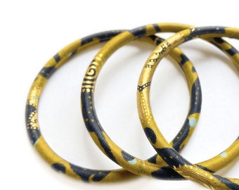 Women Ankara bracelets, an ethnic bangle bracelet to be stacked up on the wrist, a nice jewel with mustard/navy/golden colors