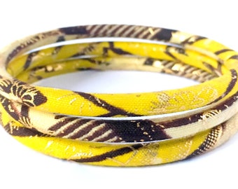 Gold wax bracelets, African Ankara loincloth bangles, a chic ethnic woman jewel in yellow/brown/white/gold