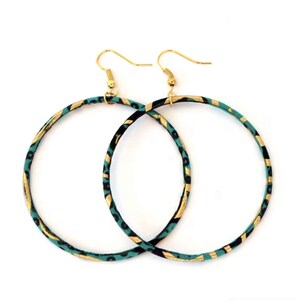 May include: A pair of large hoop earrings with gold-colored hooks. The hoops are decorated with a teal, black, and gold patterned fabric. The earrings are displayed against a white background.