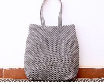 Hand woven macramé bag, a hand woven tote bag made of silver grey nylon thread from boat fishing line