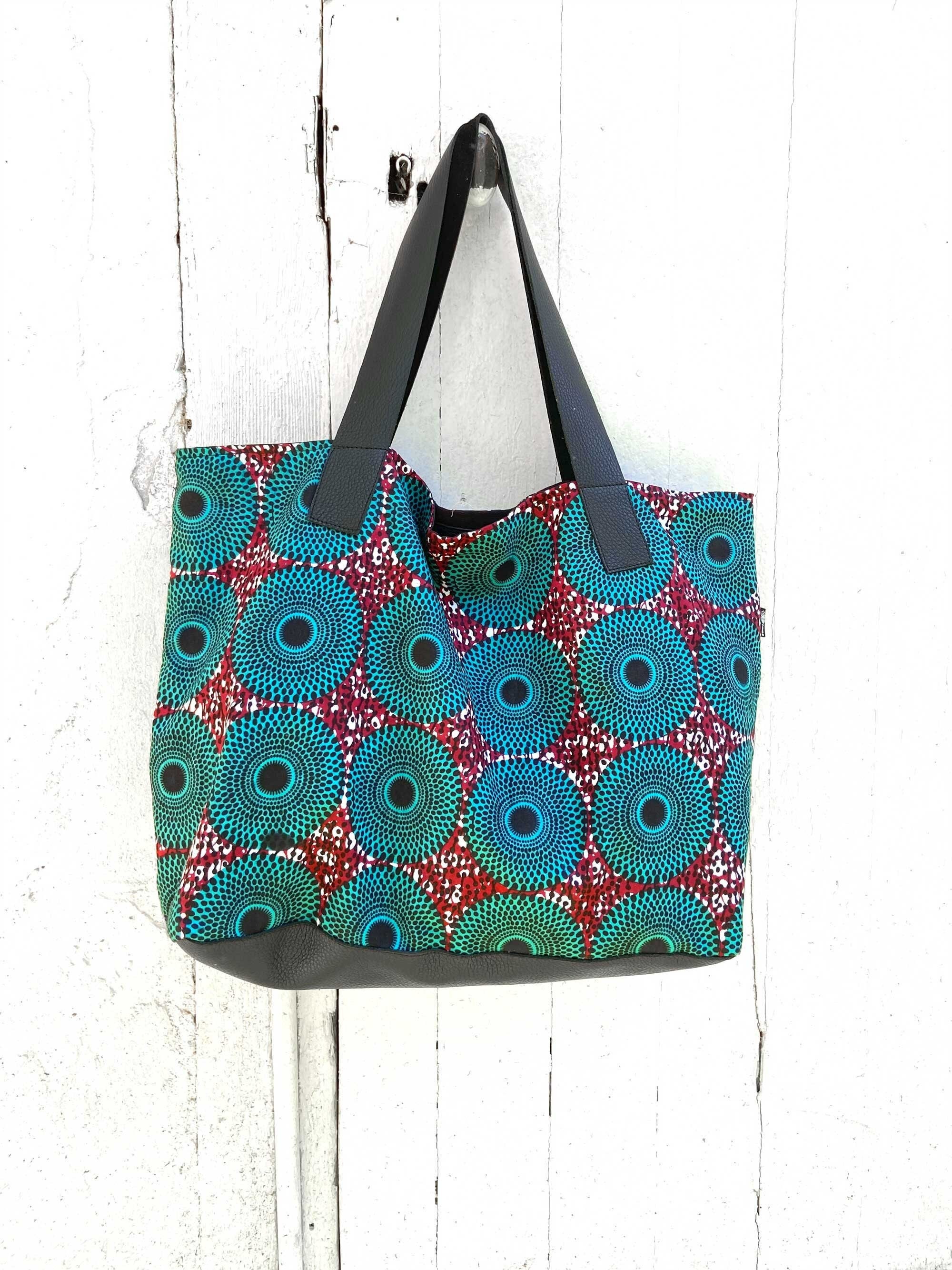 【日本入手困難】Large printed canvas and leather tote bag il_fullxfull.3949922270_2nlt.jpg