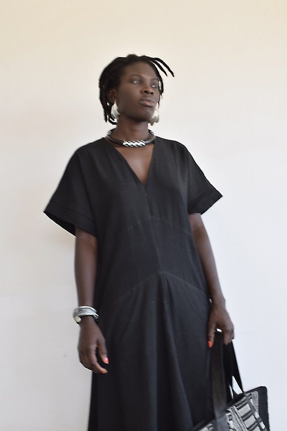 Robe noire coton mi longue sale
