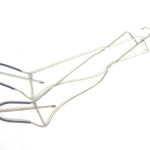 May include: Two white metal pant hangers with a curved design. The bottom bar of each hanger is covered in a dark gray material. The hangers are designed to hold pants or skirts.