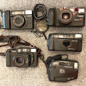 Lot of 5 non-functioning Pentax point and shoot 35mm film cameras