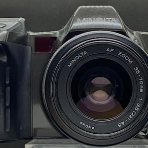 Minolta Maxxum 8000i 35mm auto focus, multi-mode programmable camera with AF 35-70mm 3.5-4.5