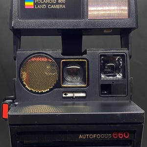 May include: A set of three ceramic mugs with a speckled, matte finish. The mugs are in shades of cream, light gray, and dark gray. Each mug has a simple, minimalist design and a rounded handle.