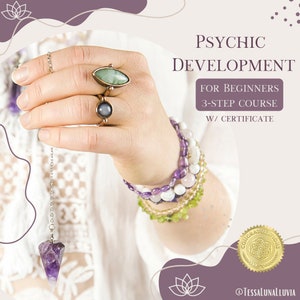 May include: A hand holding a silver chain with an amethyst pendulum. The hand is wearing several bracelets, including amethyst, white, and green stones. The background is a purple and white abstract design with the text "PSYCHIC DEVELOPMENT FOR BEGINNERS 3-STEP COURSE W/ CERTIFICATE" and a gold seal with the text "CONGRATULATIONS".