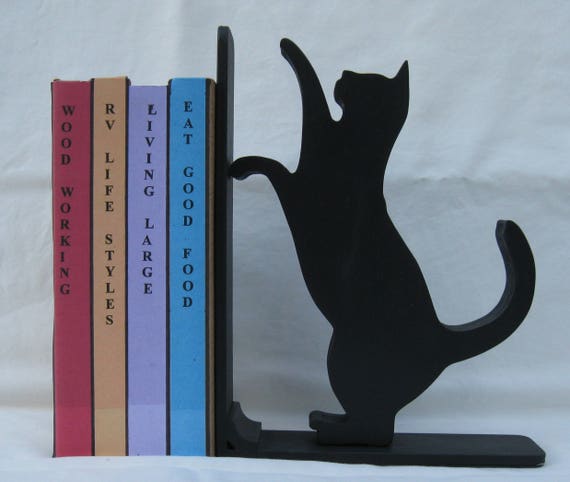 CAT REACHING BOOKEND This is One of Many in My