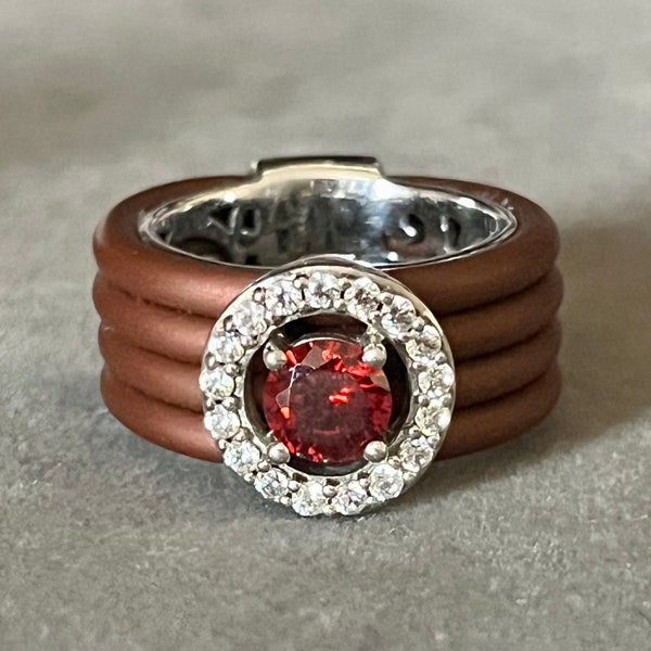 Unique Brown Rubber and Sterling Silver Belle Étoile Circa Ring with Red and Clear Stones