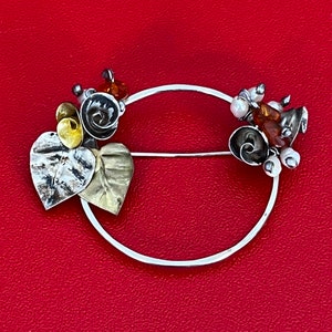 Sterling Silver Brooch with Decorative Florets and Stones