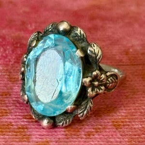 Lovely Vintage  Sterling Silver Ornate Floral Ring with Faceted Blue Glass