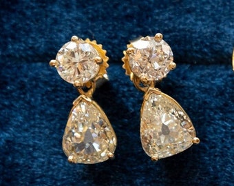 Fancy Yellow Pear Cut Diamond Earrings in 18k Yellow Gold