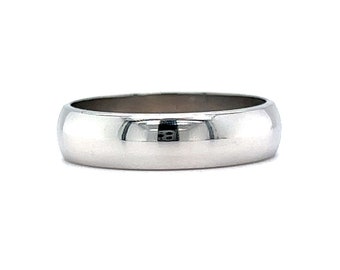May include: A simple, polished silver wedding band.