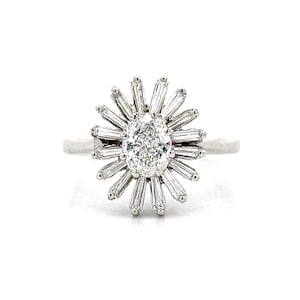 Pierścionek zaręczynowy z owalnym halo w 14-karatowym białym złocie