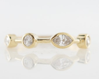 Marquise & Round Brilliant Cut Diamond Ring in Yellow Gold