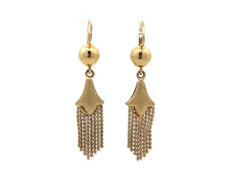 May include: A pair of gold dangle earrings with a tassel design. The earrings feature a small round ball at the top and a delicate chain tassel that hangs down.