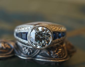 Bezel Set Diamond & Sapphire Engagement Ring in Platinum