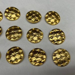 Gorgeous gold tone Buttons. Sold by 12 pieces button.