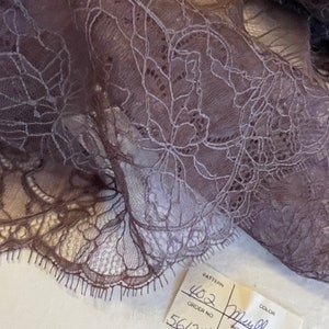 Gorgeous floral lightweight eyelash lace. MADE IN USA. Sold by the yard. 16 inches wide Floral eyelash edge Lace. Col. Mulberry Lace