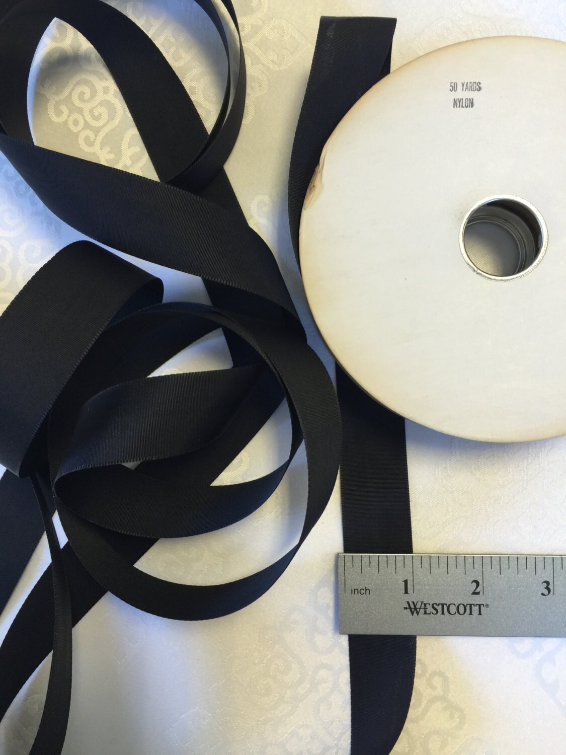 Black Paw Print on White Satin Ribbon, 7/8x25 Yards
