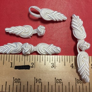 3 Pairs of White  Frog Closure.Fabric Closure. 3 1/4 inches long by 3/4 of an inch wide.