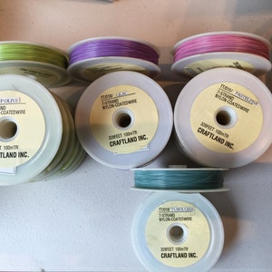 7 Strands Nylon Coated beading wire. Craft wire, Jewellery wire. Sold by the roll of 328 feet.