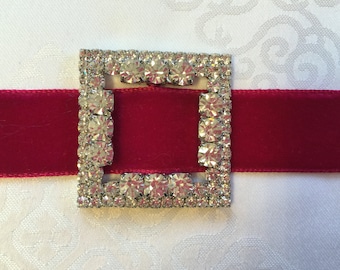 Glittrande strassspännen/-skjutremmar, tillverkade i Tjeckien.