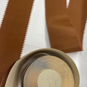 Brown Picot Gro Grain Ribbon. Sold by the roll of 10 yards.