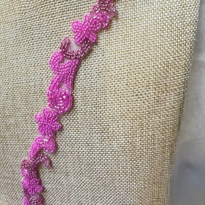 Sold by the yard. Fuchsia Beaded Trim. Trim. Beaded NarrowTrims, Beaded Appliqué. Motifs.