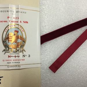 Vintage Ribbon, Old Colour Cardinal Made in France. Sold by the pack of 10 yards. Security Brand.