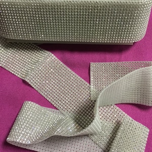 Vintage Crystal Clear Banding.16 Rows.Sold by the yard.3 inches wide. Cake decorations.