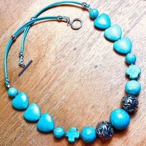 Take 10% Off@Checkout  Turquoises+6x Big-Hearts, +Turq-Howlite+Multi-Gems+ Bigger Shaped Turquoise Gems+On 2 Leather Cords  @Back+ByCherokee