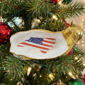 Handmade Oyster Shell NC Outline with US Flag Design | Ornament