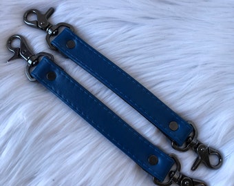 Black and Blue Restraint Clips