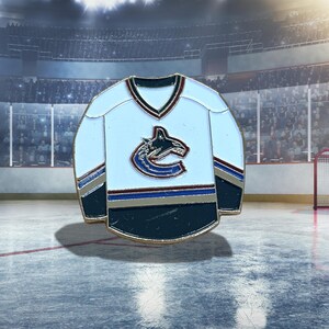 Spilla da bavero/da cappello vintage della maglia da hockey NHL dei Vancouver Canucks degli anni '90