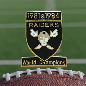 Vintage Oakland Raiders 1981 & 2984 World Champions NFL Football Lapel/ Hat Pin