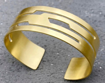 Wide gold plated cuff bracelet made of 925 sterling silver with matte finish, contemporary nature inspired jewelry, edgy abstract design