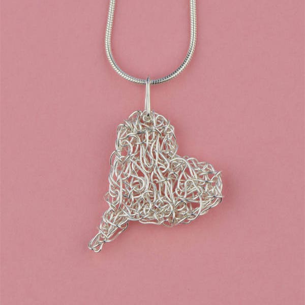 Knitted pendant in silver