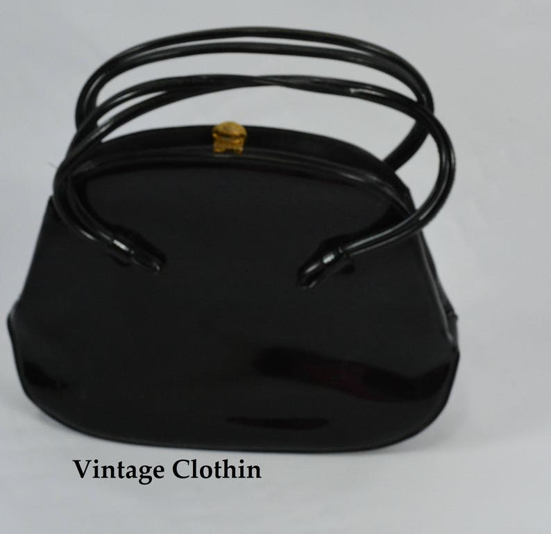 black and white patent leather purse