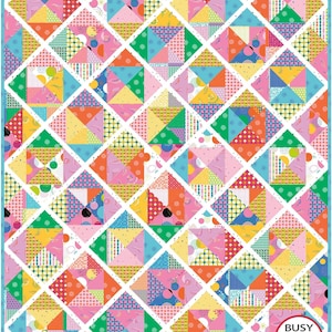 May include: A colorful quilt with a repeating geometric pattern. The design features squares and triangles in shades of pink, green, yellow, orange, and blue, separated by white lines. The quilt has a border of light blue and the text "Busy Hands Quilts" in the bottom right corner.