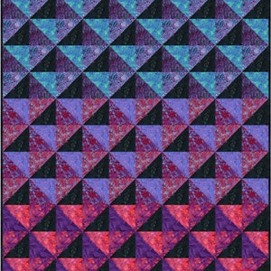 May include: A quilt pattern with a repeating triangle design. The quilt is made with three different fabrics, each with a different floral pattern. The fabrics are shades of blue, purple, and pink. The quilt is bordered with a black fabric.