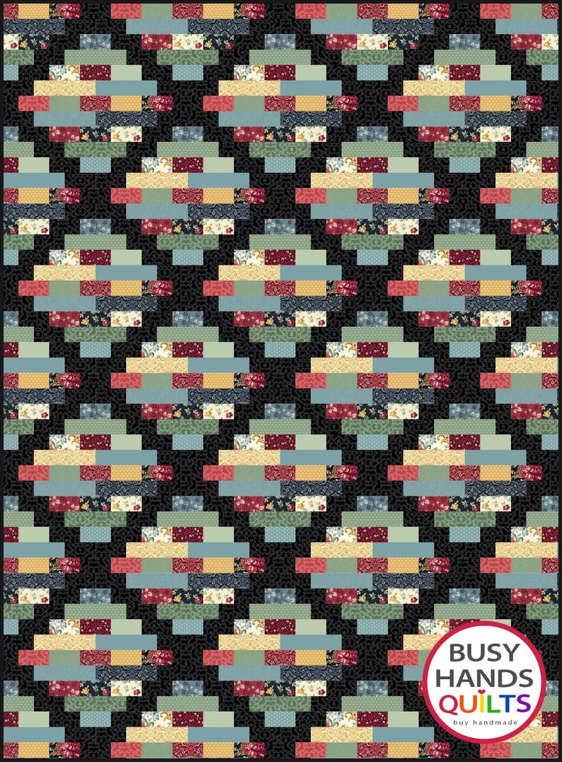 May include: A quilt with a geometric pattern in shades of red, blue, green, and yellow on a black background. The quilt is made up of small squares and rectangles. The quilt is labeled "Busy Hands Quilts" in the bottom right corner.