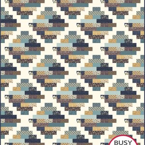 May include: A quilt with a geometric pattern in shades of blue, brown, and beige. The quilt is made up of small squares and rectangles, and the pattern is repeated throughout the quilt. The quilt is bordered by a white fabric. The quilt is labeled "Busy Hands Quilts" in a red circle with white text.