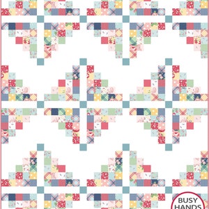 May include: A quilt pattern with a white background and a repeating pattern of blue, pink, yellow, and green patchwork hearts. The quilt is framed by a blue border. The text "BUSY HANDS QUILTS buy handmade" is in a circle at the bottom right corner of the image.