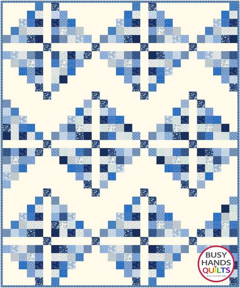 May include: A quilt pattern with a white background and a repeating pattern of blue and white squares arranged in a diamond shape. The quilt is bordered with a blue and white striped border. The text "BUSY HANDS QUILTS by Handmade" is in the lower right corner of the quilt.